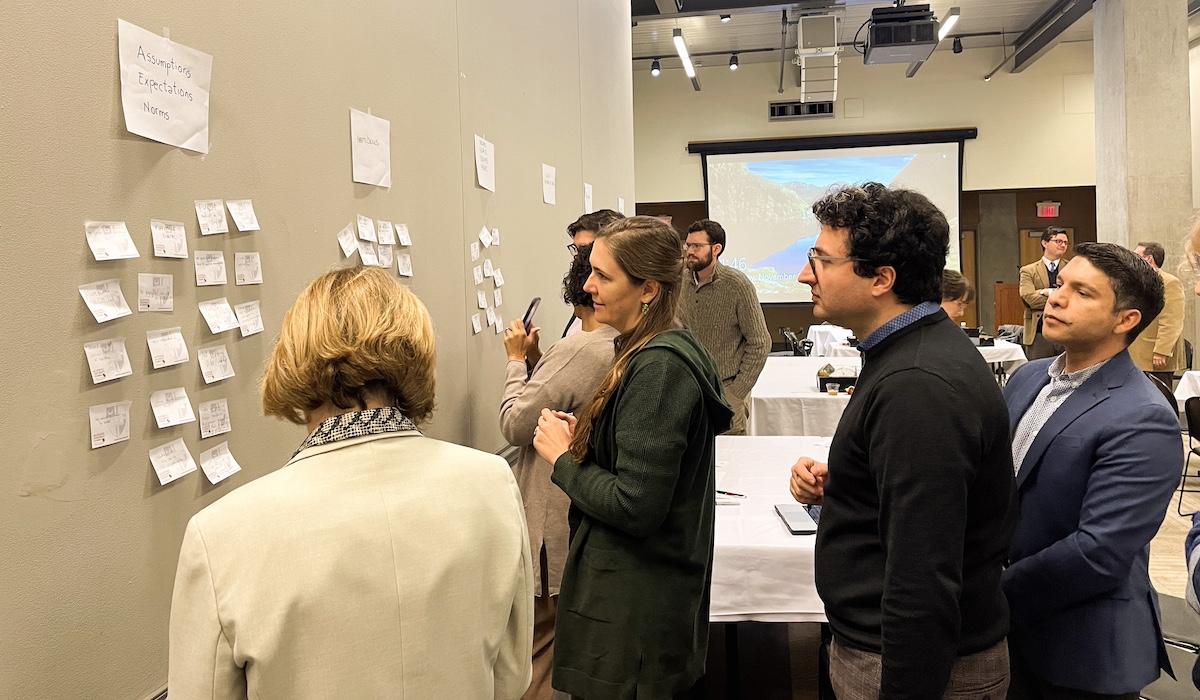 Faculty engage in a brainstorming exercise, exploring how digitization is shaping students