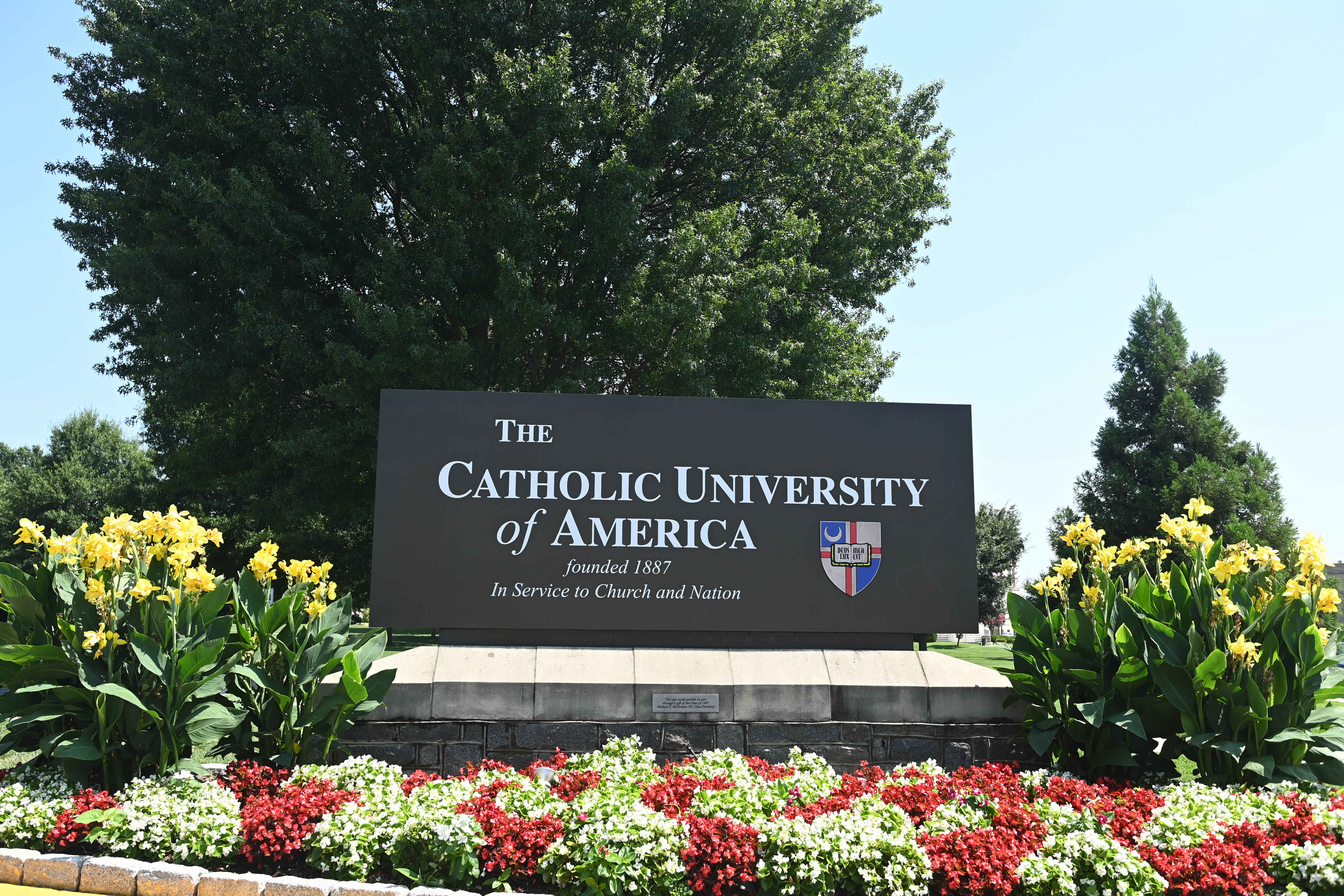 A snapshot of the campus featuring the CUA sign